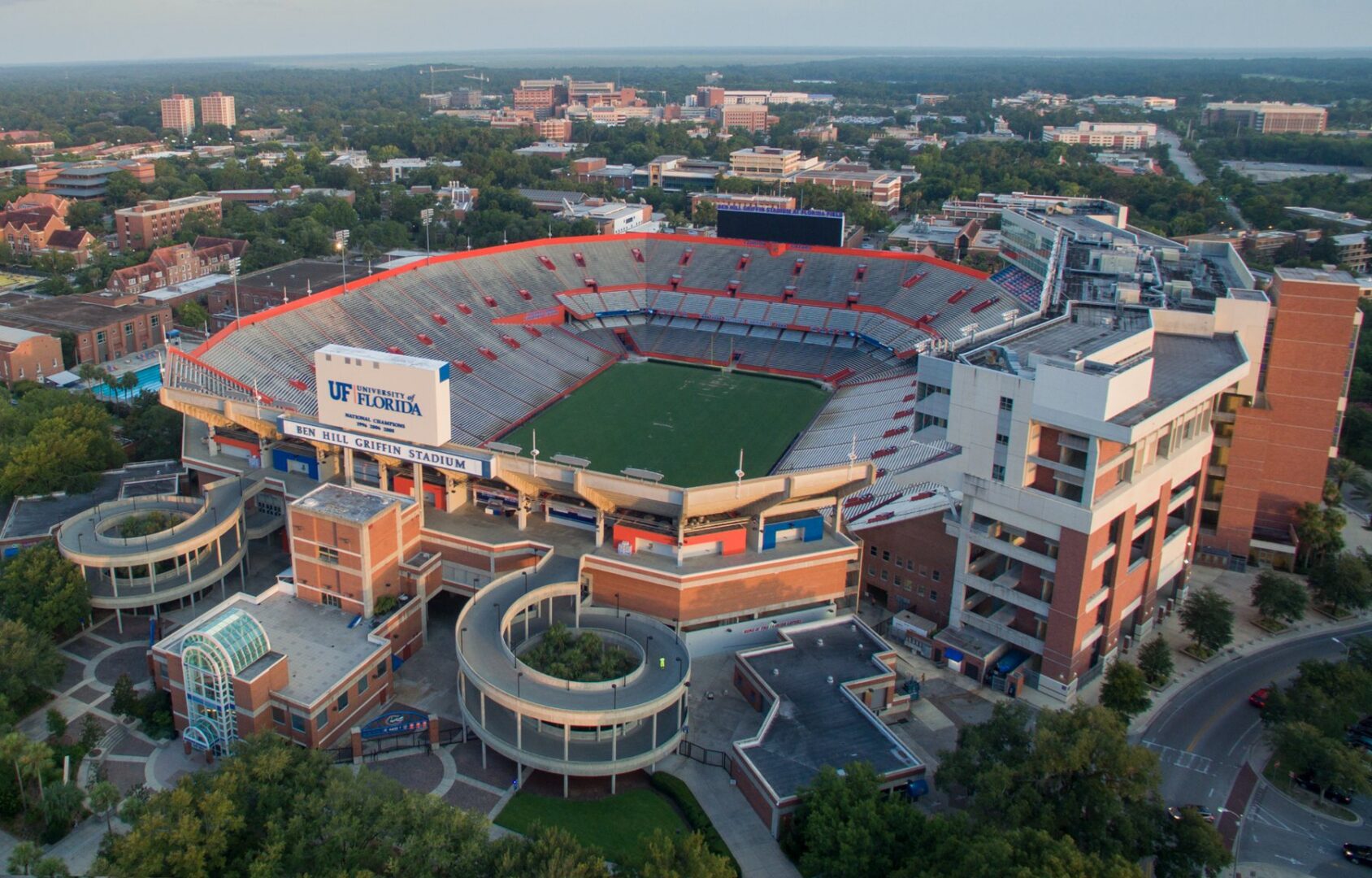 Campus stadium surrounded by buildings